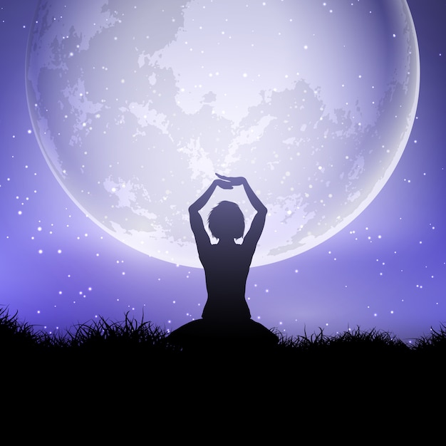 Female in yoga pose against a moonlit sky