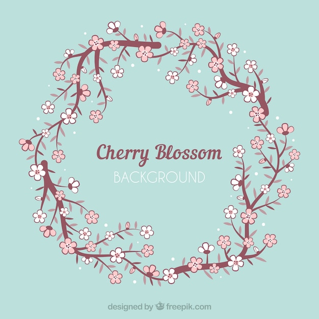 Flat background with a cherry blossom wreath