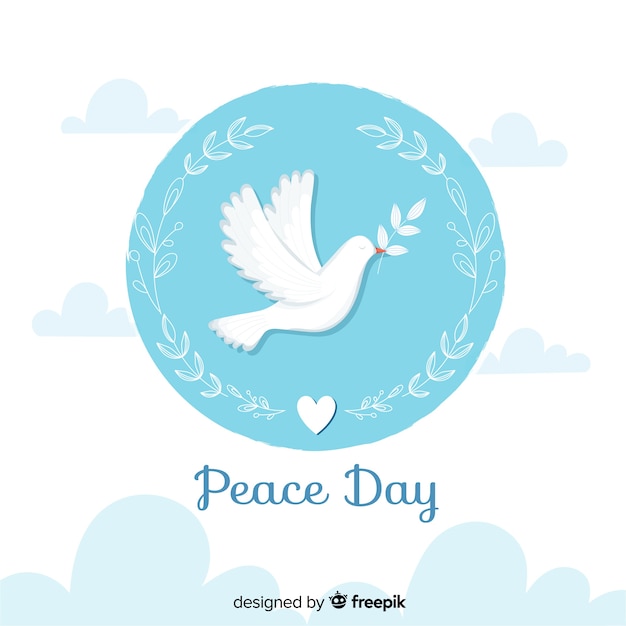 Flat peace day with dove and olive leaves