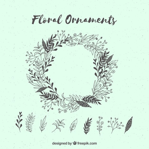 Floral wreath and hand drawn leaves