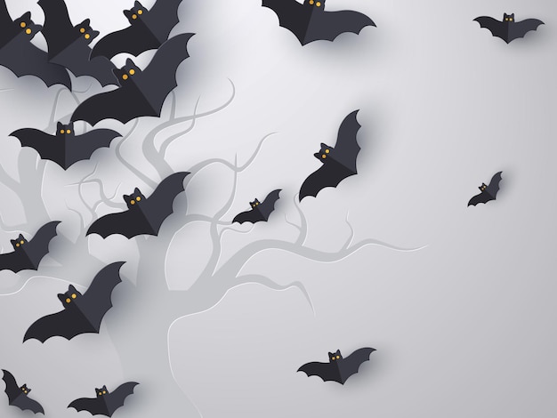 Flying bats background with copy space. 3d paper cut style. Grey background with tree silhouette for Halloween holiday. Vector illustration.