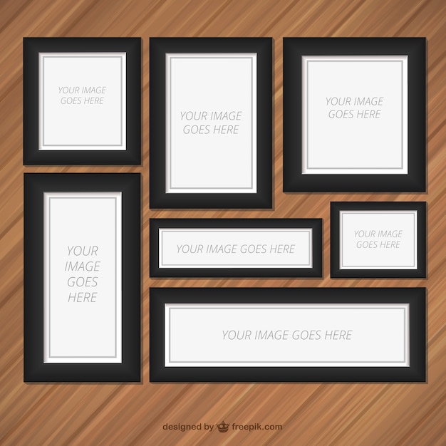 Free vector frames set on wood wall