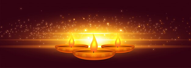 Glowing diwali diya with light sparkle banner