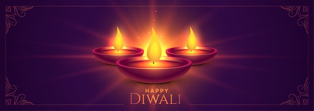 Free Vector glowing happy diwali diya lamps banner