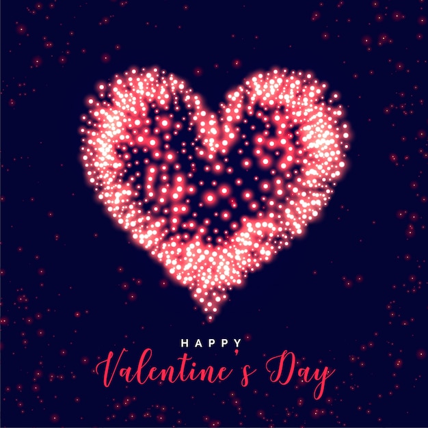 Free vector glowing valentines day heart made with sparkles background