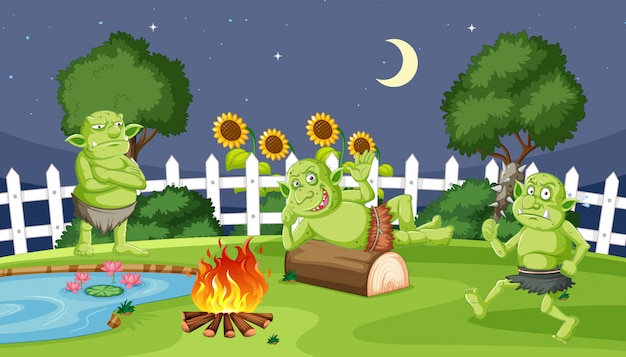 Goblins or trolls with fire camping night in cartoon style on garden background