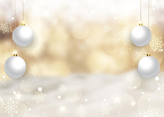 Golden Christmas background with hanging baubles on defocussed landscape