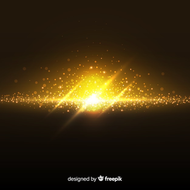 Golden explosion particle effect on black background