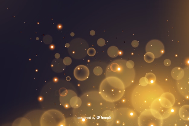 Golden particles bokeh decorative background