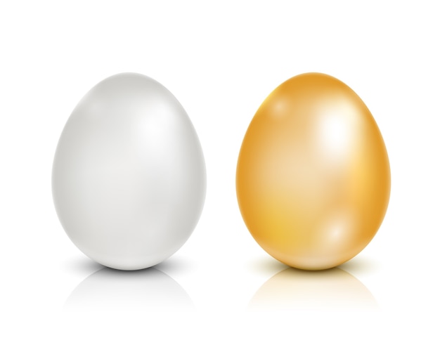 Golden and white eggs isolated