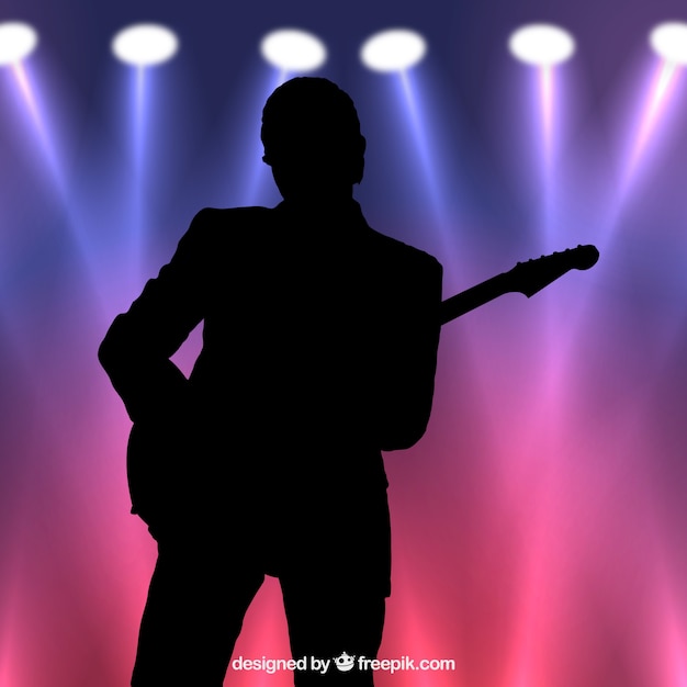 Free Vector guitarist silhouette backlit