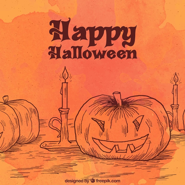 Free vector halloween background with pumpkin and candle