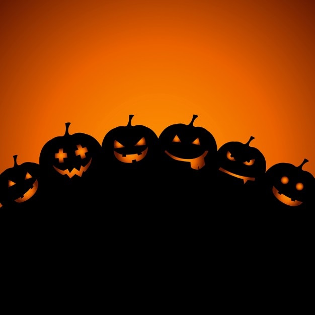 Free Vector halloween background with pumpkins