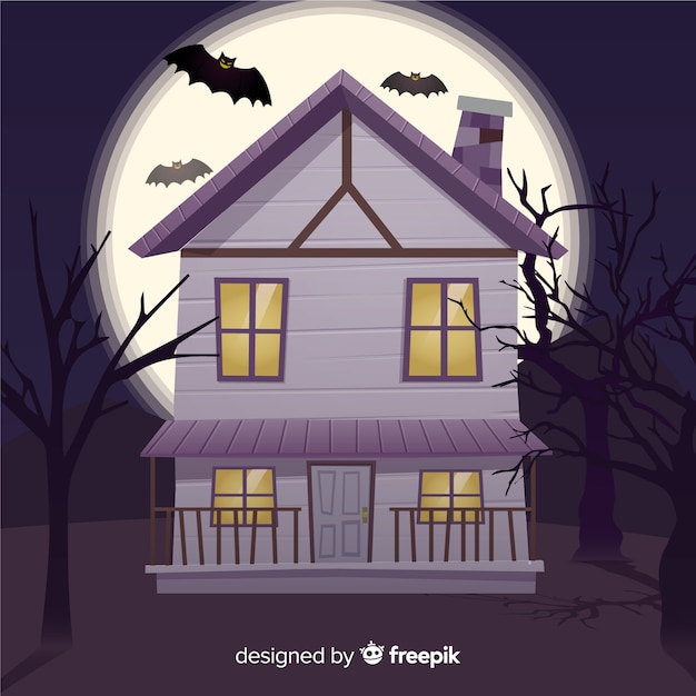 Free Vector halloween haunted house background in flat design