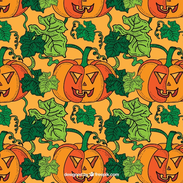 Free vector halloween pumpkins and leaves pattern