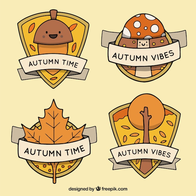 Free Vector hand drawn autumnal badges