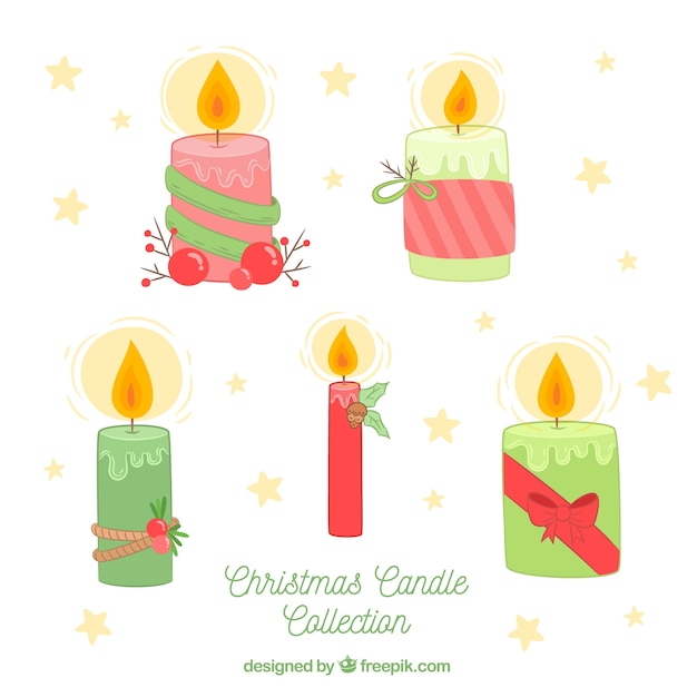 Free Vector hand drawn christmas candle collection