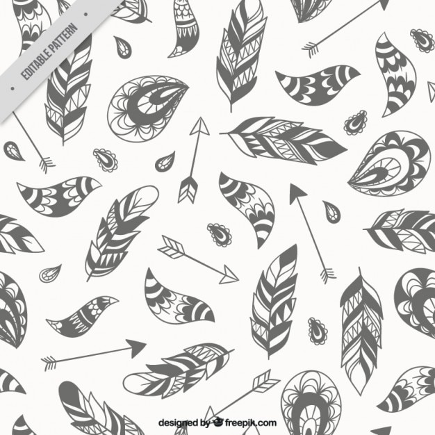 Free Vector hand drawn feathers and arrows pattern