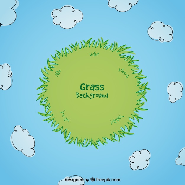 Hand-drawn grass background with clouds