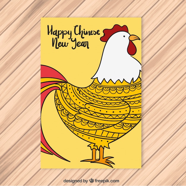 Free vector hand-drawn greeting card for chinese new year