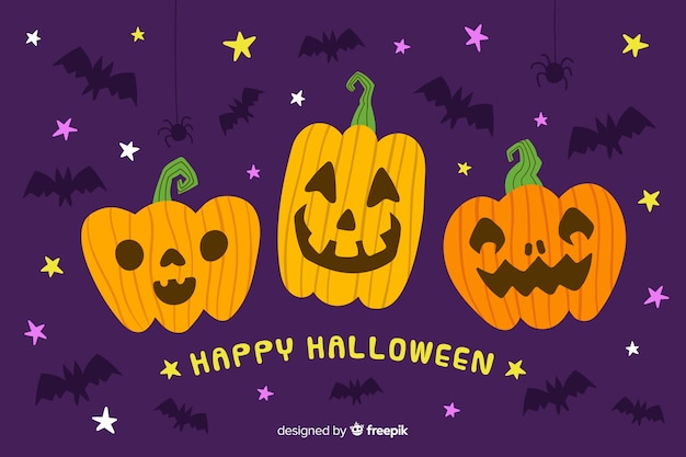 Hand drawn halloween background with pumpkins