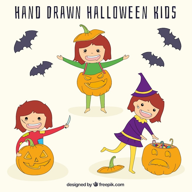 Hand-drawn halloween kids with pumpkins