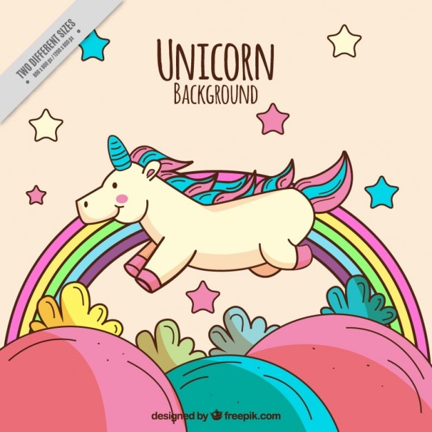 Free vector hand drawn happy unicorn in the countryside