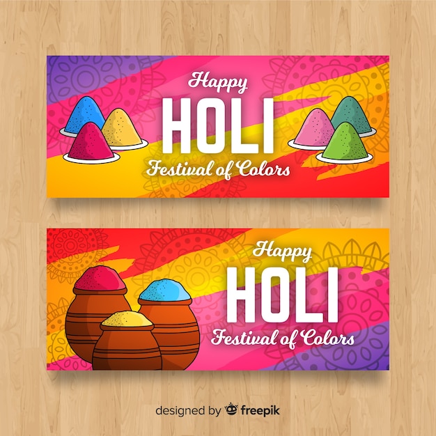 Free vector hand drawn holi festival banner