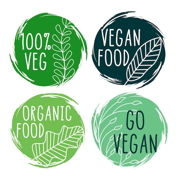 Free vector hand drawn organic vegan food labels and symbols