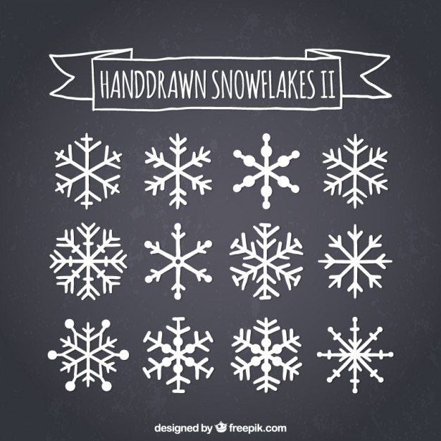 Hand drawn snowflakes on blackboard