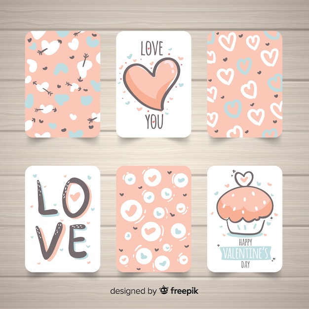 Free Vector hand drawn valentine card collection