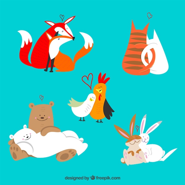 Free Vector hand drawn valentine's day animal couple collection