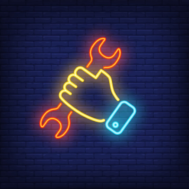 Hand holding wrench. Neon sign element