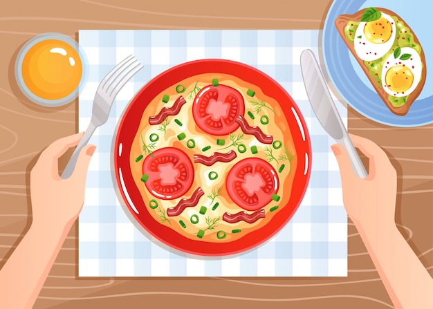 Free Vector hands with cutlery over scrambled eggs with tomatoes and bacon on wooden table flat