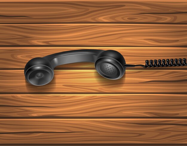 Handset On Wooden Background