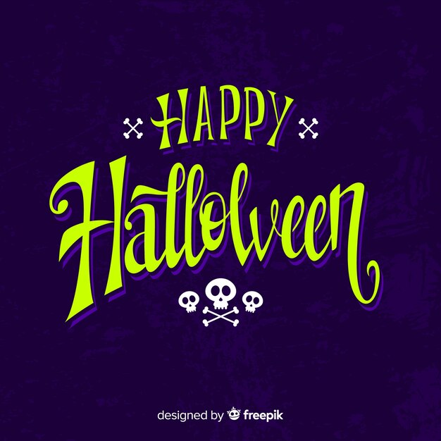 Happy halloween calligraphy with skulls