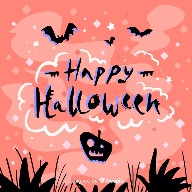 Happy halloween lettering with pink background