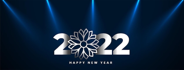 Happy new year 2022 with focus lights and snowflake banner