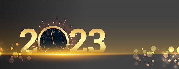 Happy new year 2023 banner with clock and bokeh light effect