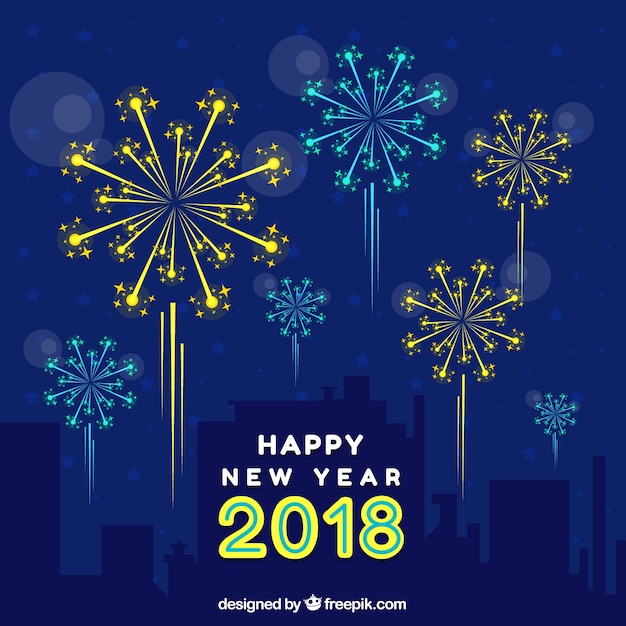 Free Vector happy new year background with flat blue and yellow fireworks