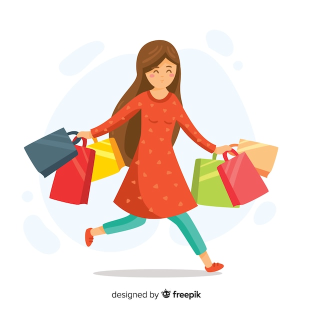 Happy woman carrying shopping bags