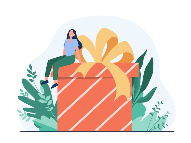 Free Vector happy woman receiving gift. tiny cartoon character sitting on huge present box with bow flat vector illustration. birthday, surprise, christmas