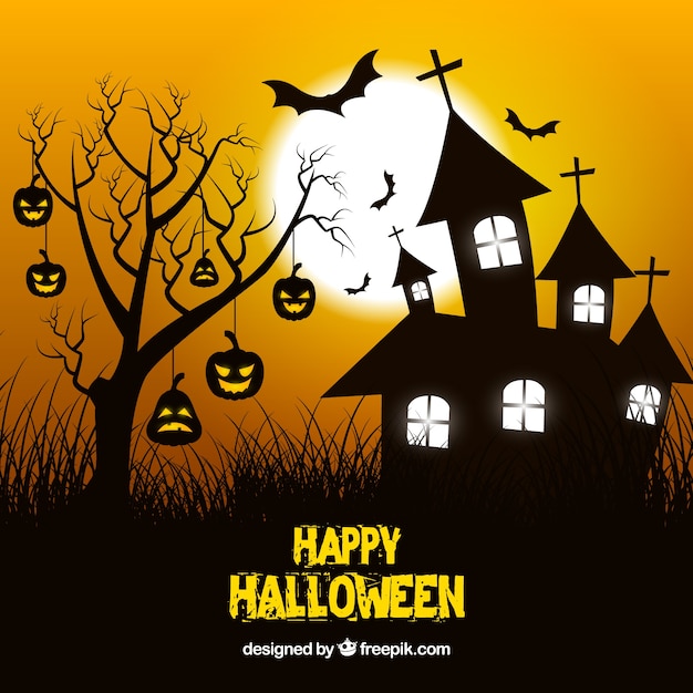 Haunted house background and tree with pumpkins