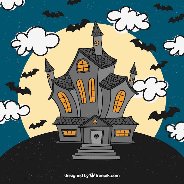 Free vector haunted house with hand drawn style