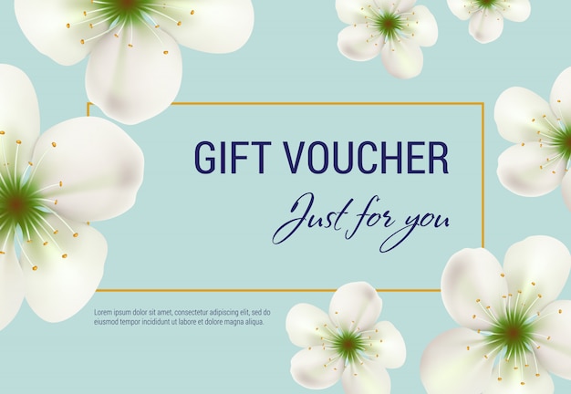 Just for you gift voucher with white blossoms and frame on light blue background. 