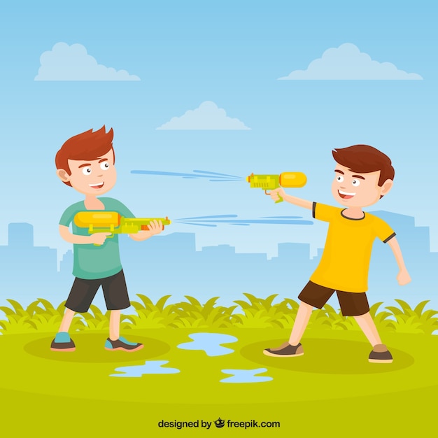 Kids playing in the park with plastic water guns