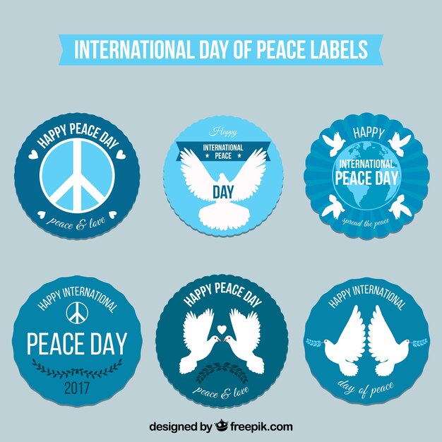 Labels with doves and peace symbols