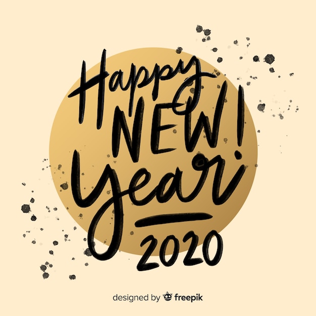 Lettering happy new year 2020 in ink