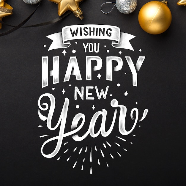 Free Vector lettering happy new year 2020 wallpaper