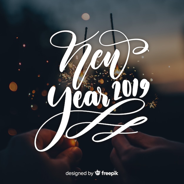 Free Vector lettering new year 2019 